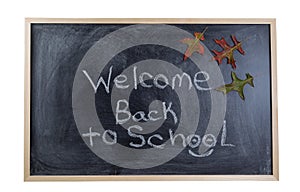 Chalkboard welcoming the student back to school in the autumn se