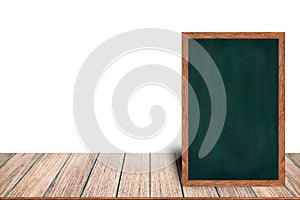 Chalkboard wood frame blackboard sign menu on wooden table is laying on white background with copy space.