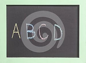 Chalkboard written A B C D