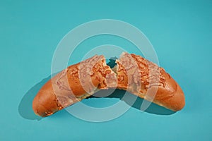 Challah bun on blue background. Minimal concept