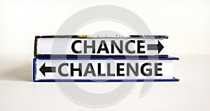 Challenge or chance symbol. Concept word Challenge or Chance on beautiful books. Beautiful white table white background. Business