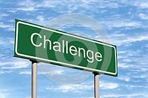 Challenge Road Sign Against Sky And Clouds