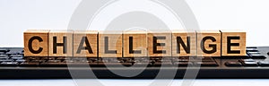 Challenge word made with wooden blocks. Business management concept. Keybord background