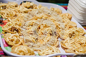 Chalupas with chicken on a tray for mexican holiday