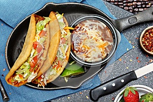 Chalupas and Refried Pinto Beans in Skillet