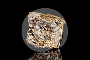 Chalybite, siderite or iron spar ore, raw rock on black background, mining and geology