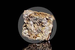 Chalybite, siderite or iron spar ore, raw rock on black background, mining and geology photo