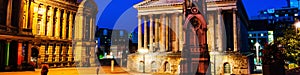 Chamberlain square at night with illuminated Town Hall and Chamberlain Memorial in Birmingham, UK