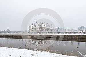 Chambord castles in winter under snow, Loire Valley, France