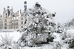 Chambord castles in winter under snow, Loire Valley, France