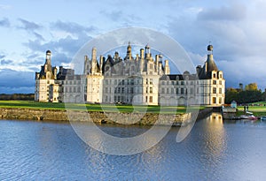 Chambord palace after rain at sunset, Loire Valley, France