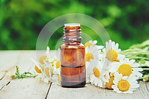Chamomile extract in a small bottle.