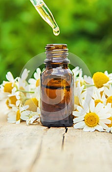 Chamomile extract in a small bottle.