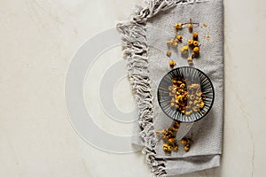 Chamomile tea on white