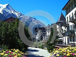 CHAMONIX MONT BLANC village with high alpine mountains range landscape in french ALPS