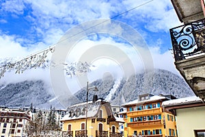 Chamonix town with snowy mountains on the background.