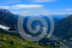 Chamonix Valley and cable car coach going to the Aiguille du Midi