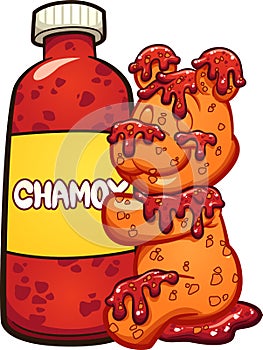 Gummy bear hugging a bottle of chamoy sauce photo