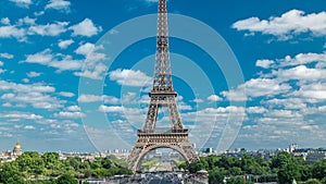 Champ de Mars and the Eiffel Tower timelapse in a sunny summer day. Paris, France