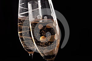 Champage glasses on black background