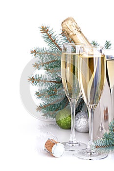 Champagne, blue firtree and christmas decor