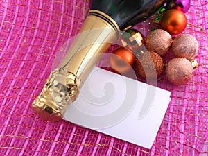 Champagne bottle and christmas decor. new year holiday card
