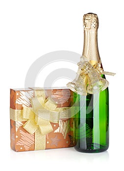 Champagne bottle, christmas gift box and decor