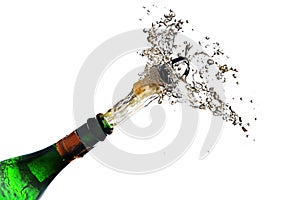 champagne bottle explosion with cork popping splash isolated against a white background, copy space, selected focus, motion blur