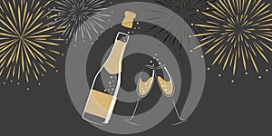 Champagne bottle and glasses with new year fireworks