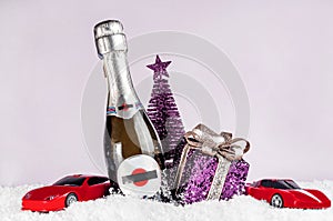 champagne bottle on a pink background, accessories for the holiday