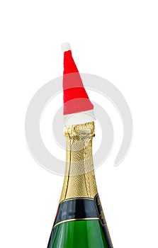 champagne bottle with red santa cap. Red santa claus hat on champagne bottle isolated on white