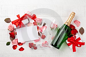 Champagne bottle and rose flowers