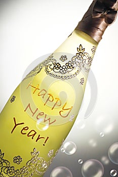 Champagne bottle very nicely decorated with the message Happy New Year