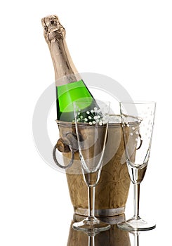 Champagne bottle in vintage ice bucket