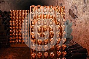 Champagne bottles in pupitre in Reims, France