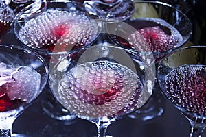 Champagne with bubbles in glasses, alcoholic drink
