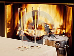 Champagne chilling by the fire