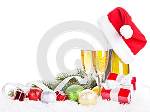 Champagne, christmas decor and santa hat