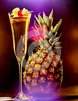 Champagne cocktail with cherry and pineapple 42