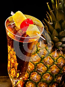 Champagne cocktail with cherry and pineapple 69