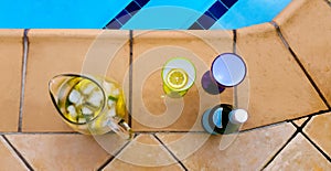 Champagne Coolers by the Pool - colorful plastic wine glasses and picture with fruit and bottle of bubbly