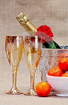 Champagne flutes in ice bucket,