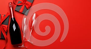 Champagne and gift: Celebratory duo on a red background with text space