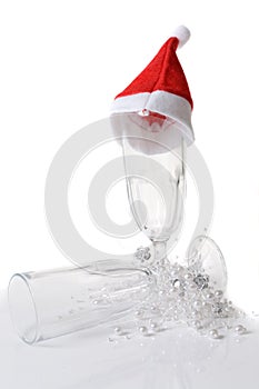 Champagne glass decorated with santa hat