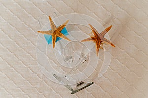Champagne glass decorated with seashell and sea star