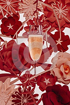 Champagne glass with flowers backdround photo