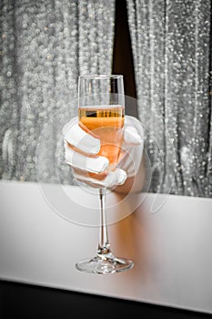 Champagne glass in hand, hostesses at the event