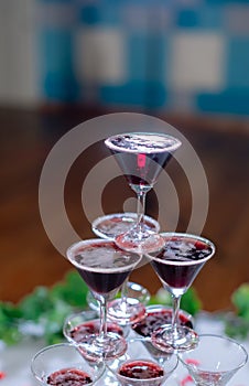 Champagne glass pyramid. Pyramid of glasses of wine, champagne, tower of champagne`s glass in wedding reception party