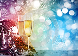 Champagne glasses against New Years background photo