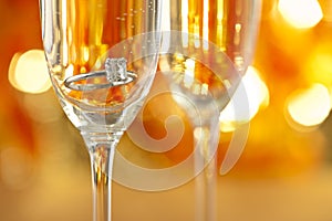 Champagne glasses with engagement Jewelry